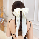 large statement satin bow with alligator clip