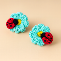 Pair of Crochet ladybug on flowers hairclip
