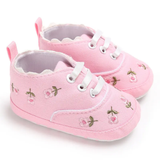 Pret my baby Embroidery sneakers - pink: adorable pre-walker shoes featuring pink floral embroidery with green leaves, white laces, and soles—perfect for your little one.
