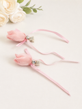 Pair of satin tulip bud fascinator hairclips with ribbon trails