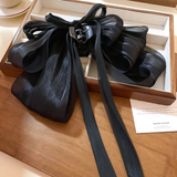 Statement multi layer bow clutcher