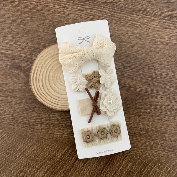 Pack of 4 ivory crochet baby hairclips style 1