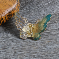 Small enamel butterfly clutcher