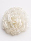 The Pret my baby Fascinator extra large flower hairclip features layered, translucent organza petals in soft pastel shades, elegantly displayed against a plain white background.