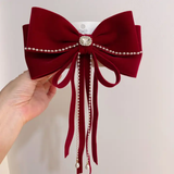 Red velvet statement bow buckle