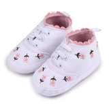Pret my baby Embroidery sneakers - white: White pre-walker shoes with pink scalloped trim, embroidered pink flowers, white laces, and soft soles.