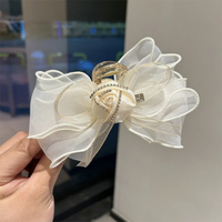 Large bow and rose clutcher