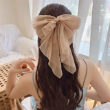 Fluffy volume bow in gossamer fabric