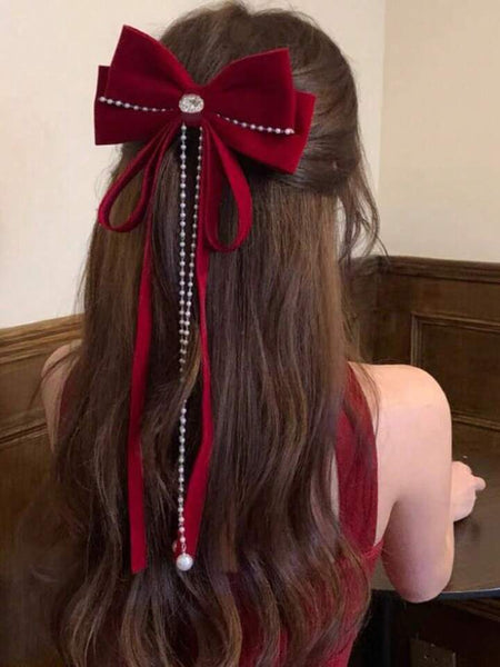 Red velvet statement bow buckle
