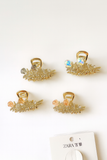 Feathers and crystals medium clutcher