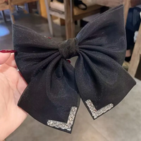 big bow buckle with rhynestone pattern