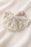 Lace bow with doiley frill