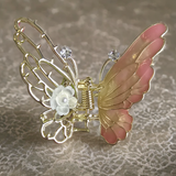 Small enamel butterfly clutcher