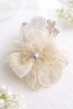 Large mesh flower and fishnet bow fascinator hairclip