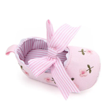 Pret my baby Embroidery bellies with stripe bow - pink: Features floral embroidery, a large pink-and-white striped bow, matching striped inner lining, and a non-slip sole for added safety.