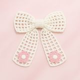 Crochet net bow with flowers