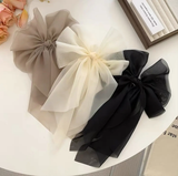 Fluffy volume bow in gossamer fabric