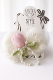 The Pret my baby Tulle curve bow with tulip and pearl ingrain fascinator hairclip features a pink satin tulip, green leaves, white tulle, small fabric flowers, and pearls on a Style Seoul card with a black bow illustration.