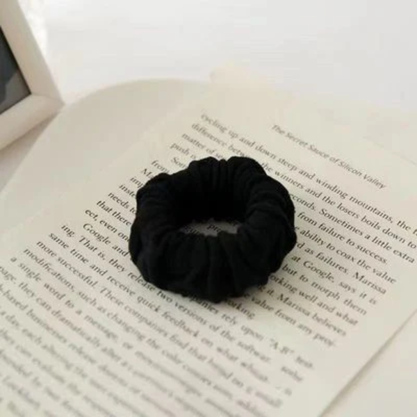 Pair of soft nude hair ties