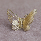 Small enamel butterfly clutcher