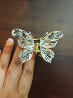 Leaf crystals and rhinestone butterfly clutcher
