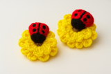 Pair of Crochet ladybug on flowers hairclip
