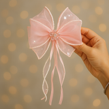 Bow fascinator hairclip with trail
