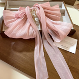 Statement multi layer bow clutcher