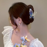 rhynestone lined flying butterfly medium metal clutcher