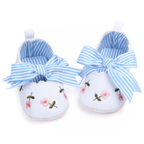 Pret my baby Embroidery bellies with stripe bow - white feature floral embroidery, blue-and-white striped bows, a soft light blue striped inner lining, heel pull tabs, and a non-slip sole for safety.