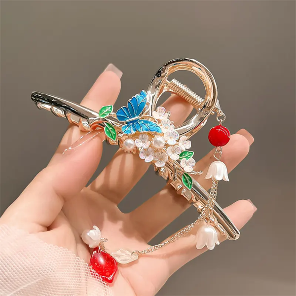 Blue butterfly with hangings on large clutcher