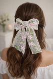 Lace bow with colourful embroidery
