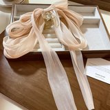 Statement multi layer bow clutcher