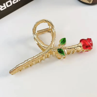 Large red rose bud clutcher