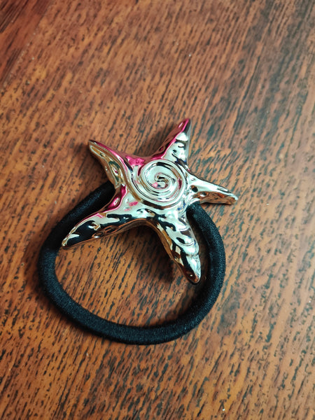 Holiday hair tie with statement embellishment