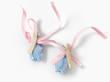 Pair of satin tulip bud fascinator hairclips with ribbon trails