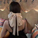 Statement multi layer bow clutcher