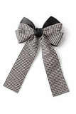 The pretmebabe Checkered Bow with trail Hair Clip features a bold black and white houndstooth pattern, solid black accents, and two long ribbon tails for classic glam style. Shown against a white background.