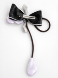 Fascinator tulip on bow with dangling bud