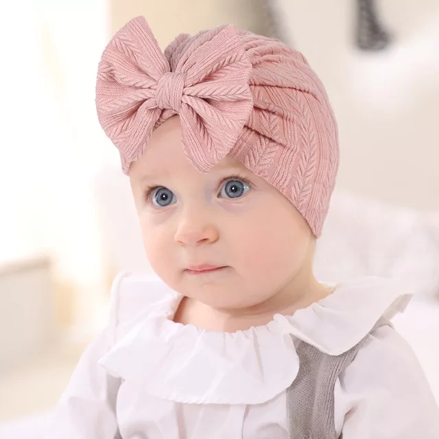 textured turban with large knot bow