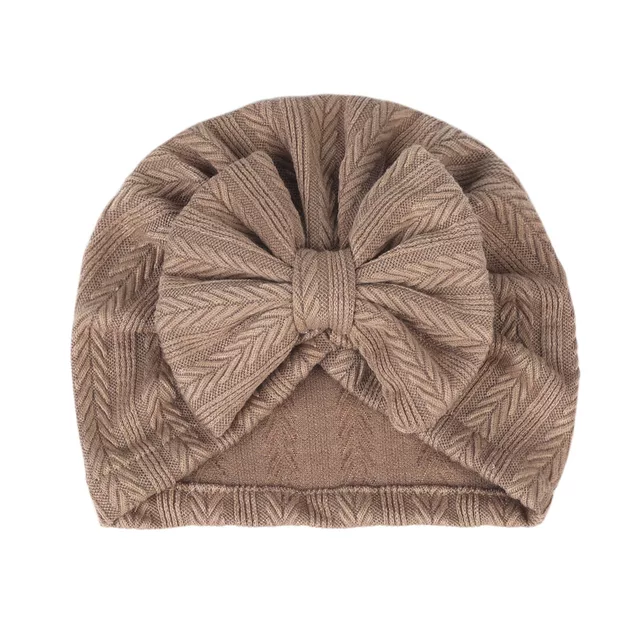 textured turban with large knot bow