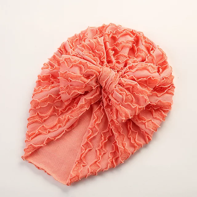 dual frill turban with large knot bow