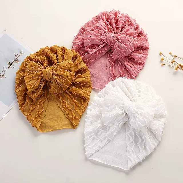 dual frill turban with large knot bow