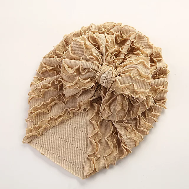 dual frill turban with large knot bow