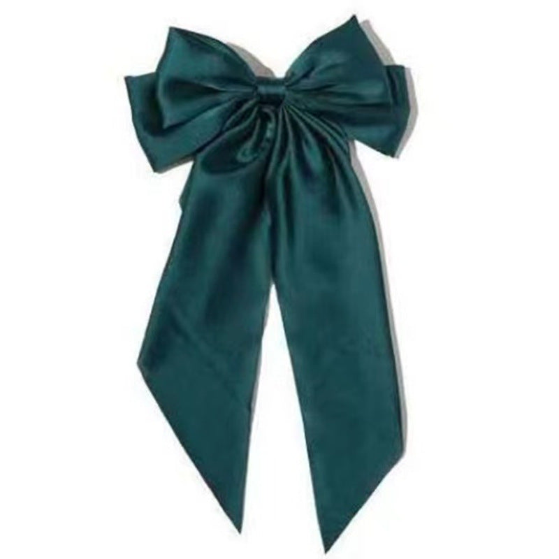 large statement satin bow buckle