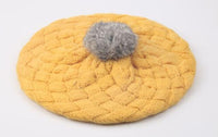 Thick woollen beret cap with pompom